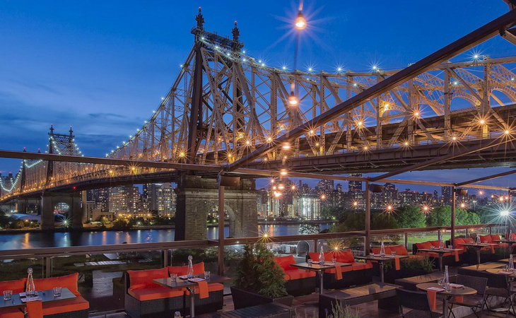 View of Manhattan from Penthouse 808 rootop bar in Long Island City