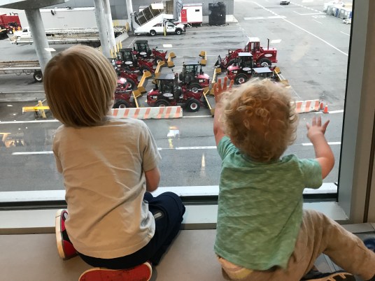 Aussie kids in NYC looking at trucks out the window
