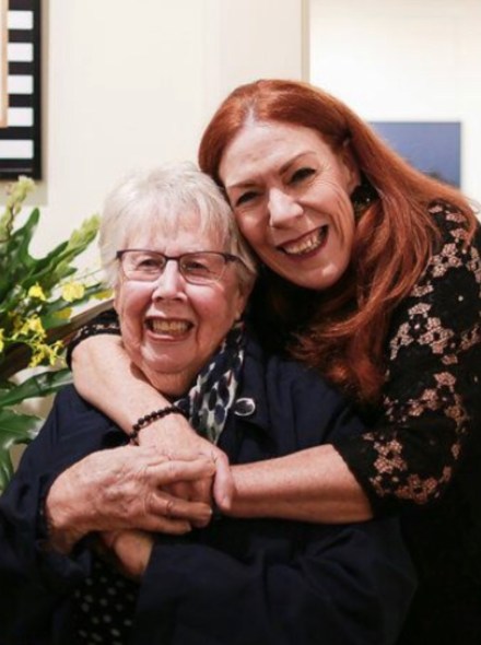 woman hugging her mother