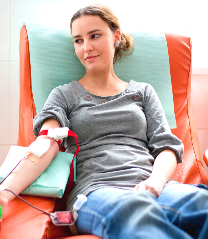 woman donating blood at blood bank
